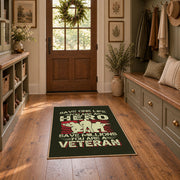 Veteran homecoming tribute area rug in black, red, cream, and green, wide interior view