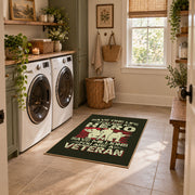 Veteran homecoming tribute area rug in black, red, cream, and green, design detail view