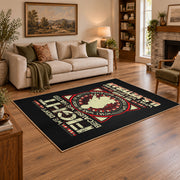 Military service emblem area rug in black, red, cream, and gold, angled room view