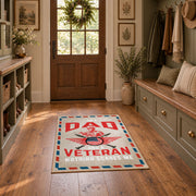 Veteran freedom tribute area rug in cream, red, blue, and black, featured room view