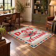 Veteran freedom tribute area rug in cream, red, blue, and black, wood floor styling