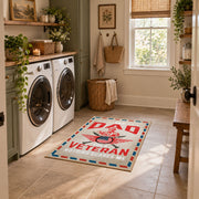 Veteran freedom tribute area rug in cream, red, blue, and black, wide interior view