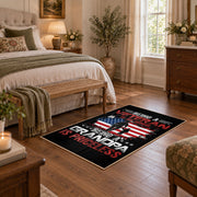 American service flag area rug in black, red, white, and blue, cozy home setting