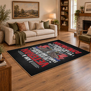 Eagle veteran honor area rug in black, red, gray, and cream, angled room view