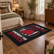 Space service emblem area rug in black, red, white, and gray, soft surface detail