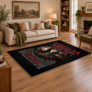 Fallen soldier memorial area rug in black, red, cream, and gray, angled room view