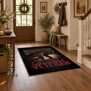Fallen soldier memorial area rug in black, red, cream, and gray, close decorative detail