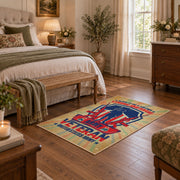 Military service shield area rug in beige, blue, red, and cream, cozy home setting