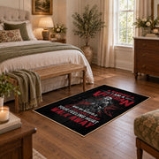 Woman veteran tribute area rug in black, red, gray, and cream, cozy home setting