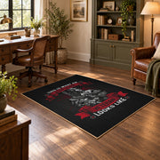 Soldier veteran honor area rug in black, red, gray, and cream, wood floor styling