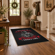Soldier veteran honor area rug in black, red, gray, and cream, close decorative detail