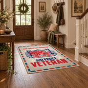 Veteran air mail graphic area rug in cream, red, blue, and black, close decorative detail