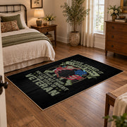 Military family honor area rug in black, green, red, and cream, soft surface detail