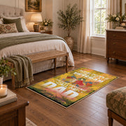 Proud soldier family area rug in yellow, green, orange, and cream, cozy home setting