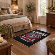Veteran honor emblem area rug in black, red, gray, and cream, cozy home setting