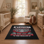 Veteran honor emblem area rug in black, red, gray, and cream, full pattern view