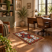 Red and blue ornate floral area rug with a traditional medallion pattern, complete product view
