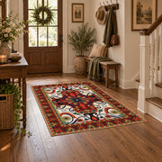 Red and blue ornate floral area rug with a traditional medallion pattern, close decorative detail