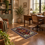Red and navy Persian medallion area rug with ornate floral details, complete product view