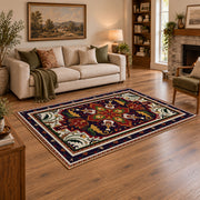 Red and navy Persian medallion area rug with ornate floral details, angled room view