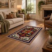 Red and navy Persian medallion area rug with ornate floral details, design detail view