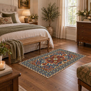 Teal and rust Persian floral area rug with an ornate allover pattern, cozy home setting