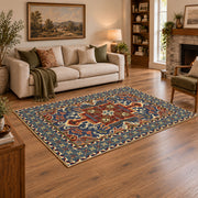 Teal and rust Persian floral area rug with an ornate allover pattern, angled room view