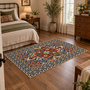 Teal and rust Persian floral area rug with an ornate allover pattern, soft surface detail
