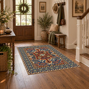 Teal and rust Persian floral area rug with an ornate allover pattern, close decorative detail