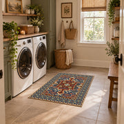 Teal and rust Persian floral area rug with an ornate allover pattern, wide interior view
