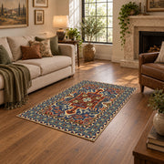 Teal and rust Persian floral area rug with an ornate allover pattern, design detail view