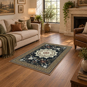 Black and cream floral medallion area rug with a traditional Persian layout, cozy home setting