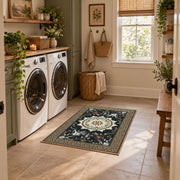 Black and cream floral medallion area rug with a traditional Persian layout, design detail view