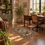 Beige and red tribal symbol area rug with a geometric Southwest-inspired pattern, complete product view