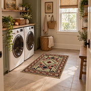 Beige and red tribal symbol area rug with a geometric Southwest-inspired pattern, design detail view