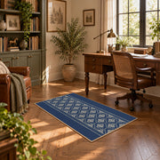 Blue and white geometric area rug with a minimal diamond pattern, complete product view