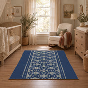 Blue and white geometric area rug with a minimal diamond pattern, full pattern view