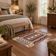 Beige and purple Southwestern area rug with bold tribal geometric motifs, cozy home setting