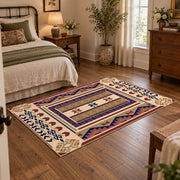 Beige and purple Southwestern area rug with bold tribal geometric motifs, full pattern view
