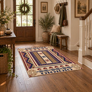 Beige and purple Southwestern area rug with bold tribal geometric motifs, wood floor styling