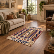 Beige and purple Southwestern area rug with bold tribal geometric motifs, design detail view