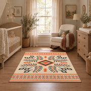 Cream and orange tribal diamond area rug with black and gray accents, full pattern view
