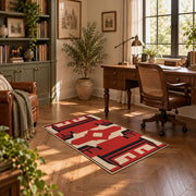 Red and black tribal cross area rug with cream geometric details, complete product view