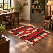 Red and black tribal cross area rug with cream geometric details, soft surface detail