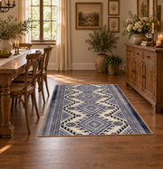 Blue and white diamond area rug with an allover traditional geometric pattern, front room mockup