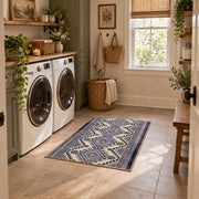 Blue and white diamond area rug with an allover traditional geometric pattern, wide interior view