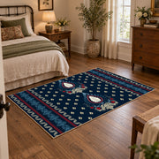 Navy and red Persian area rug with a detailed traditional medallion, soft surface detail
