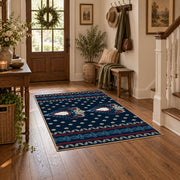 Navy and red Persian area rug with a detailed traditional medallion, close decorative detail