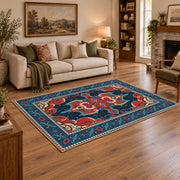Teal and red Persian area rug with ornate floral details and a patterned border, angled room view