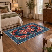 Teal and red Persian area rug with ornate floral details and a patterned border, soft surface detail